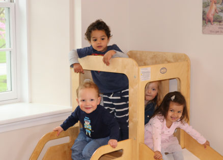 Children playing before getting ready for their parent child Montessori class